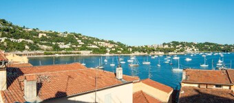 26. A colorful apartment with a beautiful sea view and a balcony