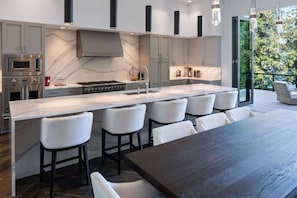 Fridge, microwave, oven, stovetop - Luxury Waterfront | Chef's Kitchen | Titans Landing (Sagle)