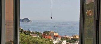 Maiso house nestled between the sea and olive trees
