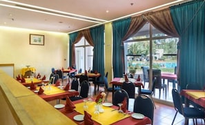 Breakfast, lunch, dinner served; local and international cuisine
