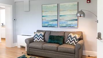 303 | Living room | 55-inch flat-screen TV with digital channels, TV, Netflix