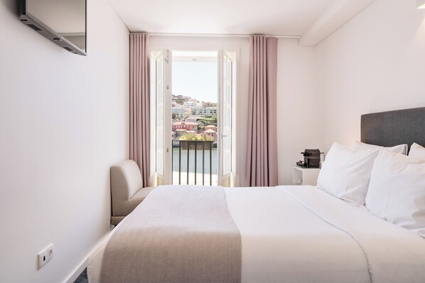 Individually decorated, individually furnished, blackout curtains - Miragaia Riverside Suites. (Porto)