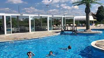 Seasonal outdoor pool, cabanas (surcharge), pool umbrellas