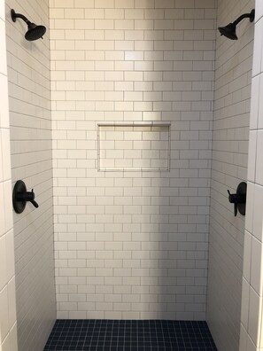Combined shower/bathtub, hair dryer, towels, soap