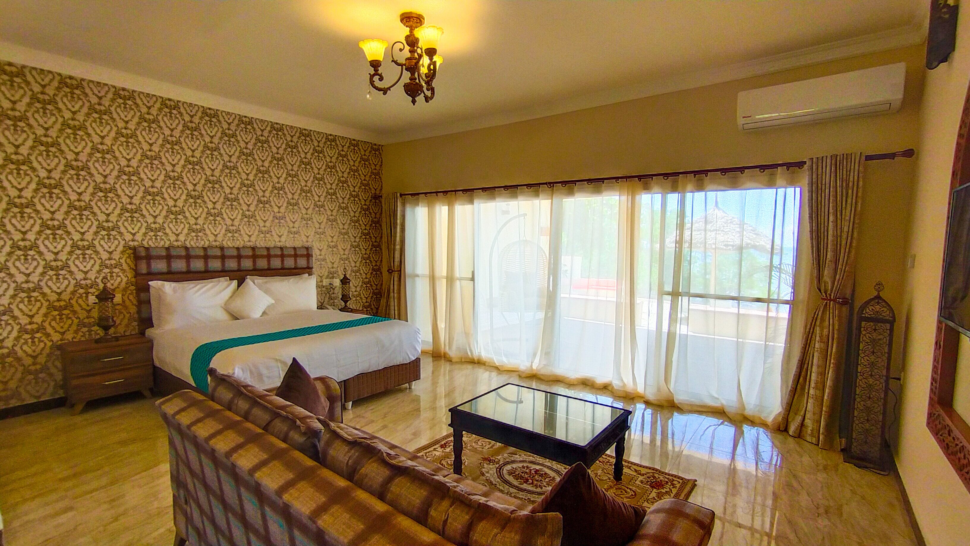 executive double room, ocean view | premium bedding, minibar, desk, blackout curtains