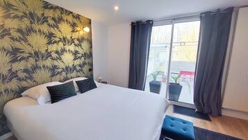 Deluxe tweepersoonskamer | Individueel gedecoreerd, individueel gemeubileerd, een bureau