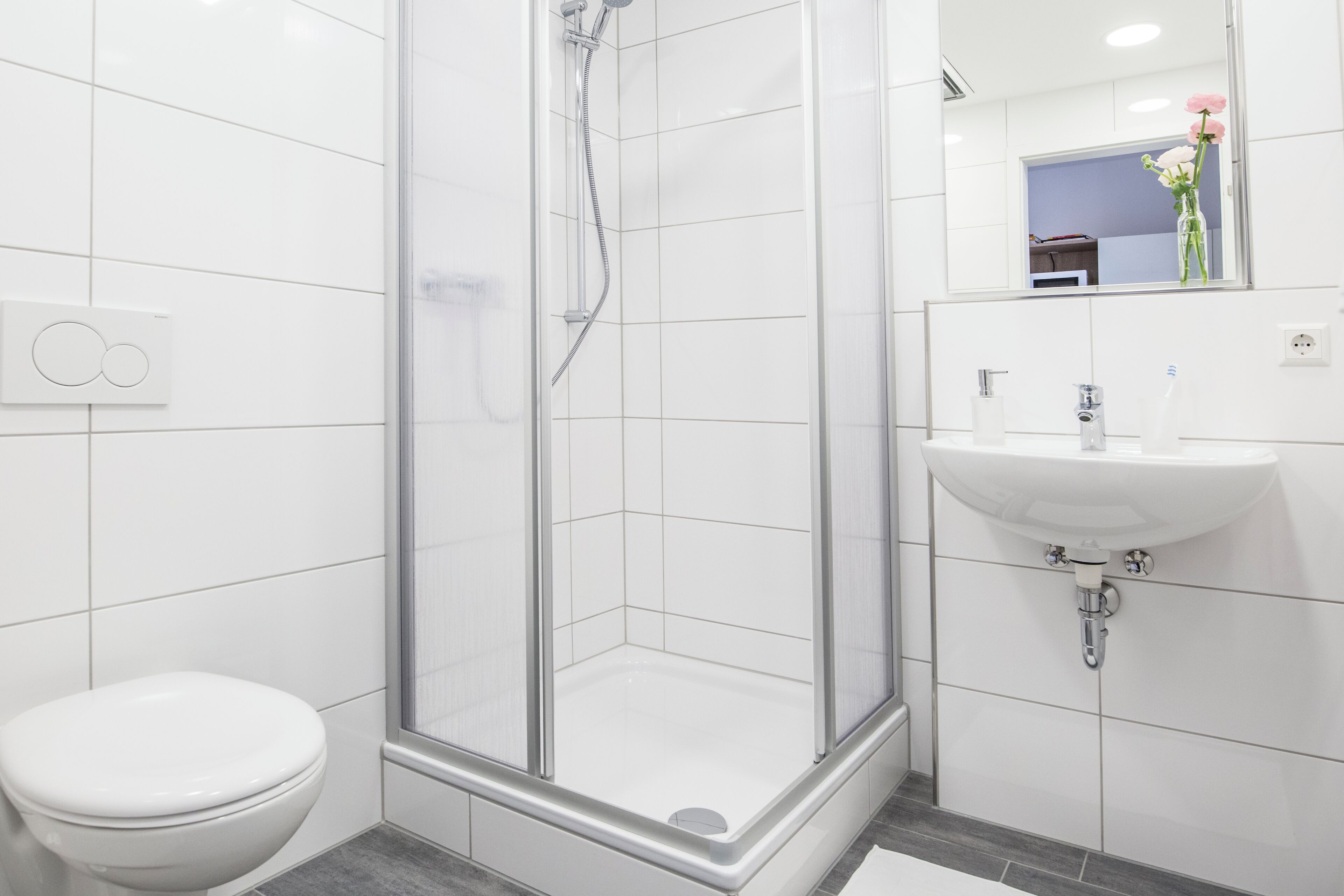 Shower, towels, soap, toilet paper