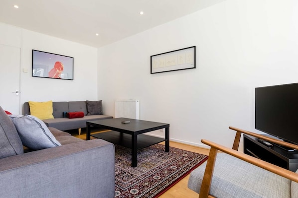 Apartment (4 Bedrooms) | Living area | 20-inch TV with digital channels