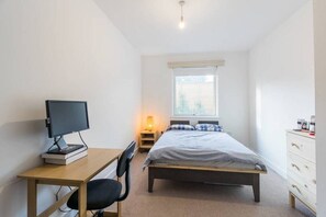 2 bedrooms, desk, laptop workspace, iron/ironing board