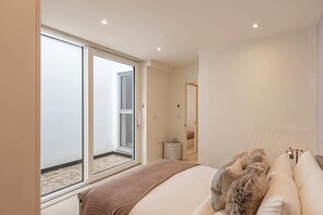 Hus (2 Bedrooms) | 2 soverom, skrivebord for bærbar PC og strykejern/-brett