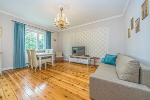 Apartment, 2 Bedrooms | Living area | Flat-screen TV