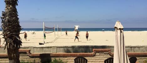 On the beach, sun-loungers, beach towels