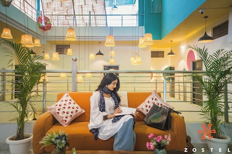 32-inch flat-screen TV with satellite channels, books