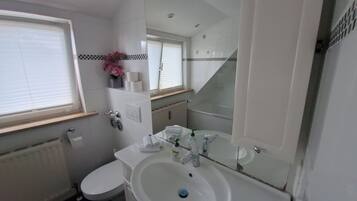 Hair dryer, towels, soap, toilet paper