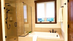Combined shower/tub, hair dryer, towels, soap