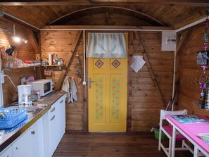 Fridge, microwave, stovetop, coffee/tea maker