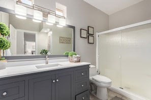 Combined shower/tub, hair dryer, towels, soap