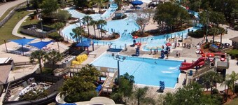 Enchanting tropical waterfront villa with boat slip, bikes, kayaks heated  pool!