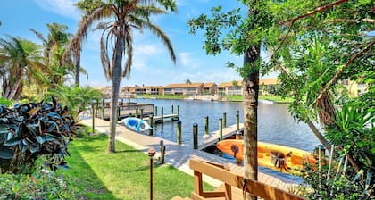 Enchanting tropical waterfront villa with boat slip, bikes, kayaks heated pool!