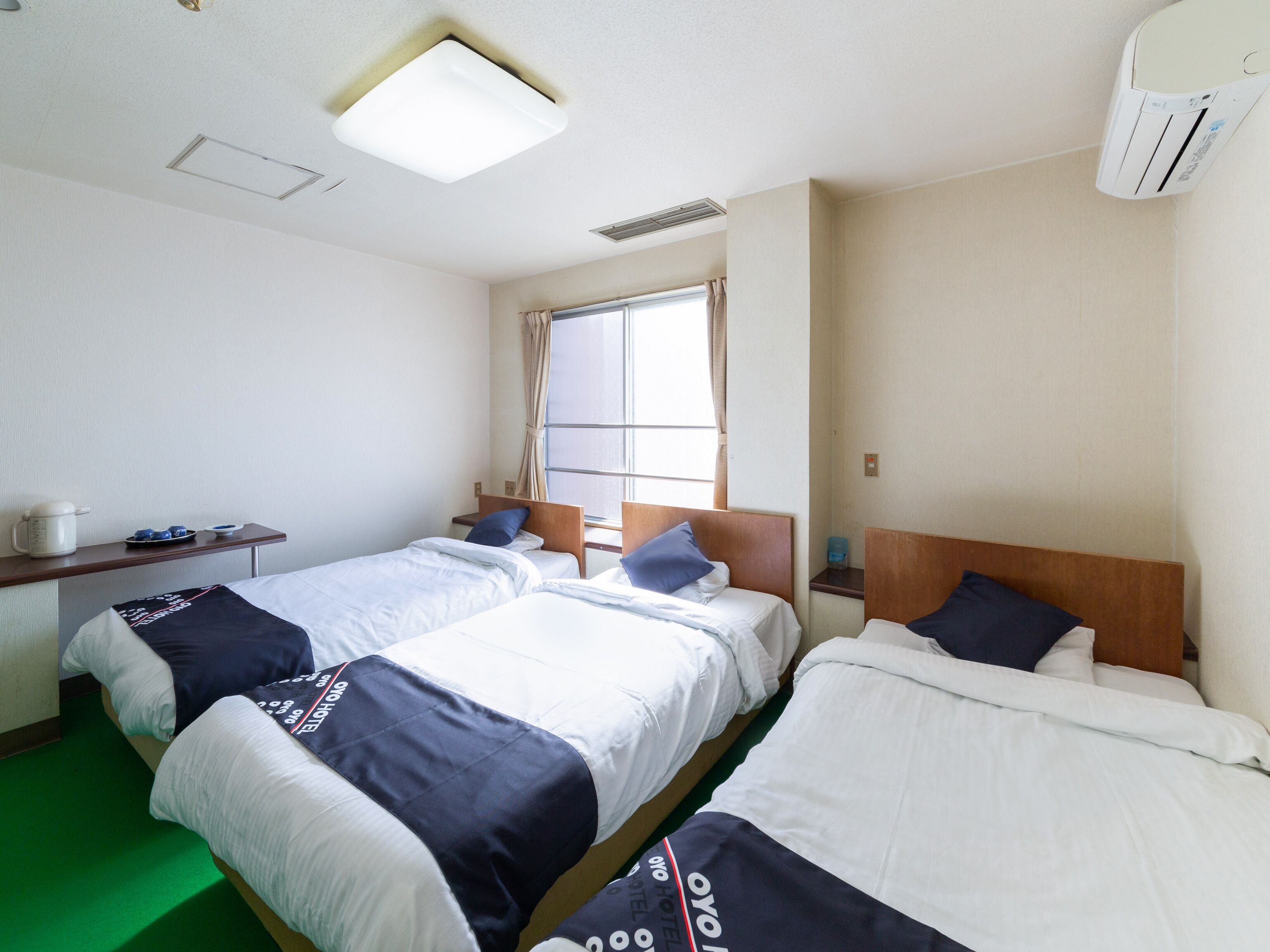 Chambre Triple, fumeur