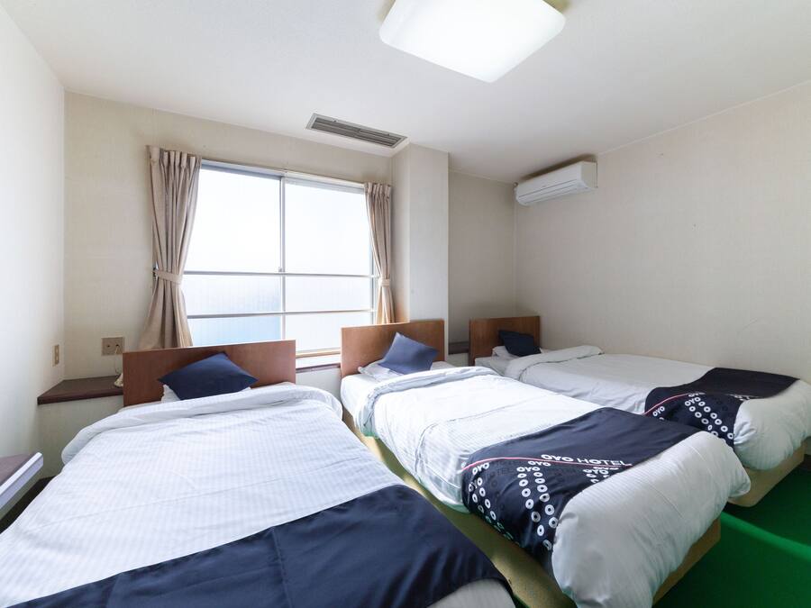 Chambre Triple, fumeur