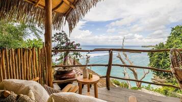 Deluxe Room, Beach View | Terrace/patio