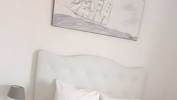 4 slaapkamers, een strijkplank/strijkijzer, gratis wifi, beddengoed