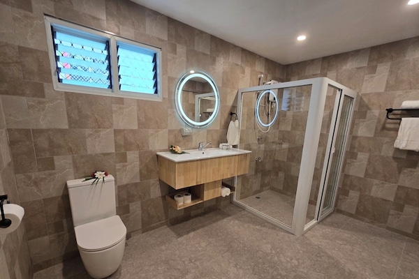 Shower, hair dryer, towels, soap