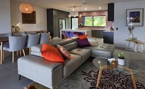 Luxury Room, 3 Bedrooms, 2 Bathrooms | Living area | 55-cm Smart TV with digital channels, TV, iPod dock