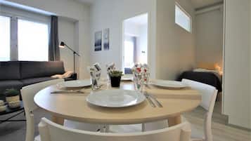Standard Apartment | Individually furnished, desk, blackout drapes, iron/ironing board
