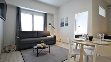 Standard Apartment | Individually furnished, desk, blackout curtains, iron/ironing board