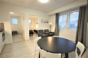 Classic Apartment | Living area | Flat-screen TV