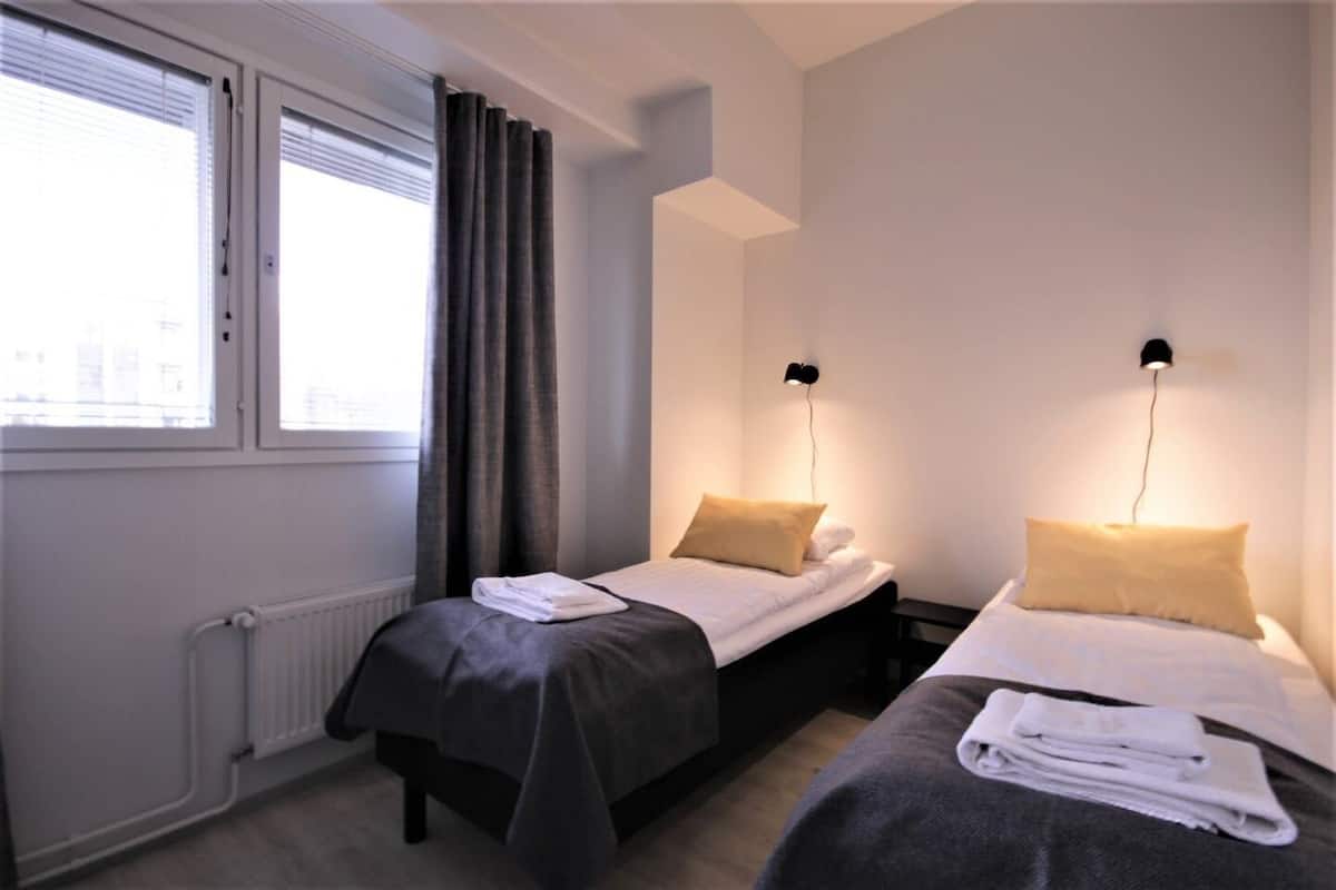 Apartment, 2 Bedrooms, Sauna | 1 bedroom, individually furnished, desk, blackout drapes