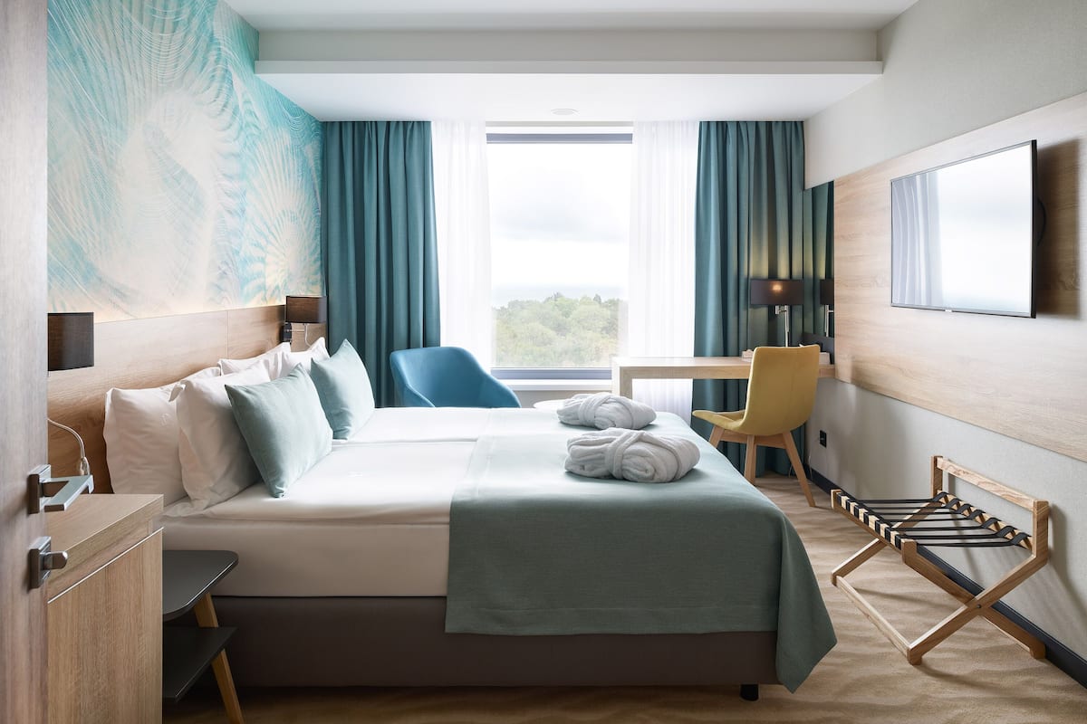 Ropa de cama de alta calidad y minibar 