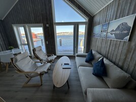 Seaview Rorbu Vega | Living area | 40-inch Smart TV with digital channels, TV, heated floors