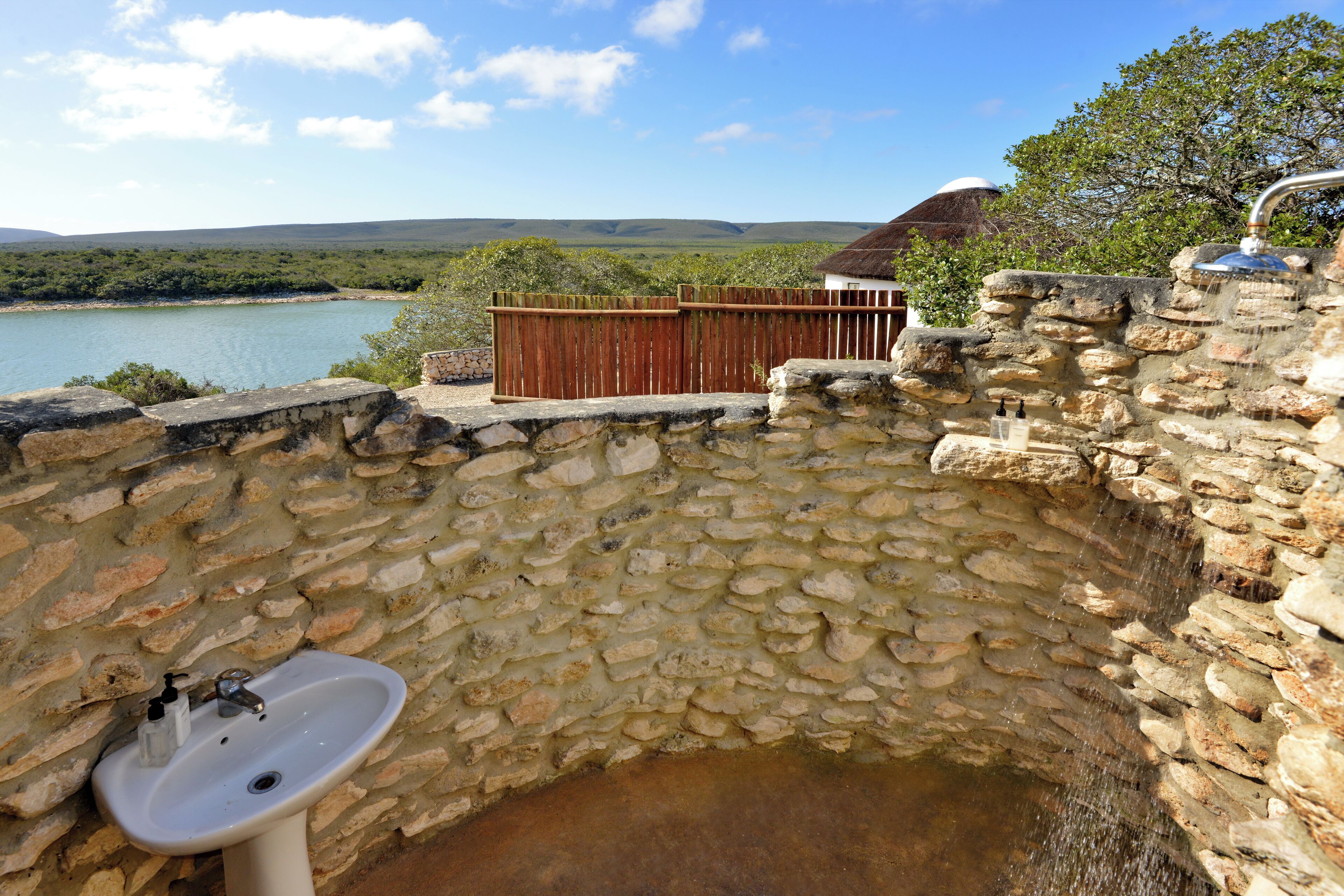 Shower, towels, soap, toilet paper