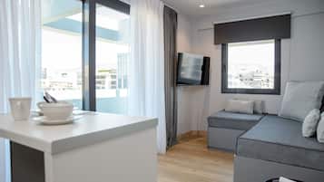 Family Apartment | Living area | 43-inch Smart TV with satellite channels, TV