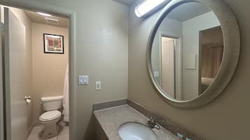 Standard Double Room, 1 Queen Bed | Bathroom | Combined shower/tub, hair dryer, towels, soap