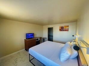 Desk, laptop workspace, free WiFi, bed sheets