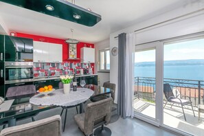 Apartment (A2) | Private kitchen | Fridge, microwave, oven, stovetop