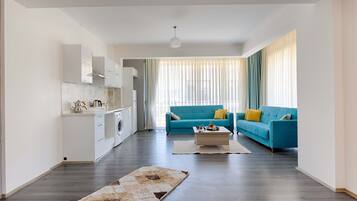 Deluxe Condo, 3 Bedrooms | Living area | 102-inch LCD TV with satellite channels, TV