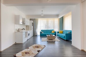 Deluxe Condo, 3 Bedrooms | Living area | 102-inch LCD TV with satellite channels, TV - Midtown Fethiye Residences (Fethiye)