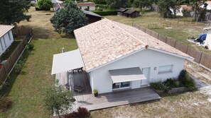 Relax on the covered porch, surrounded by a, secure yard.