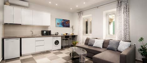 Apartment (Serenity) | Living area | Flat-screen TV