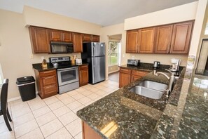 House, 4 Bedrooms | Private kitchen | Highchair