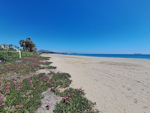 A beach with a clear sky, a sandy shore, and a ship in the distance. - FH - Holiday rental near the beach in Vera Playa (Vera playa)