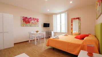 City appartement, 1 slaapkamer | Verduisterende gordijnen, een strijkplank/strijkijzer, gratis babybedden