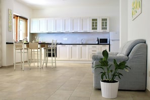 Comfort-Apartment, 1 Schlafzimmer (Sapore di mare) | Wohnbereich | Fernseher