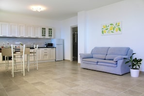 Comfort-Apartment, 1 Schlafzimmer (Sapore di mare) | Wohnbereich | Fernseher