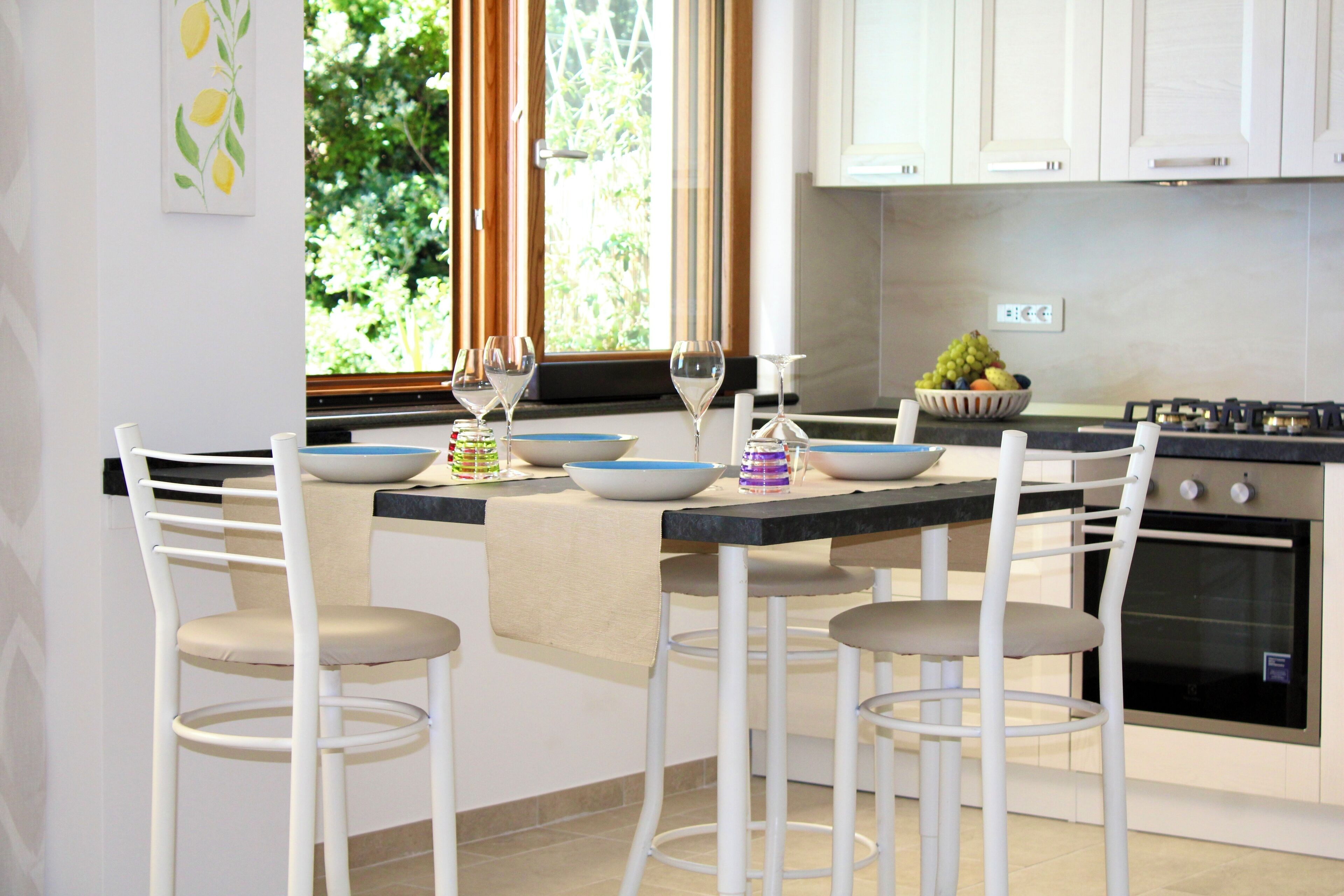 Apartamento Confort, 1 habitación (Sapore di mare) | Cocina privada | Frigorífico, horno, placa de cocina y máquina de café espresso